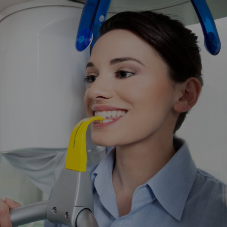 A Lady Taking Dental Treatments On Modern Technology