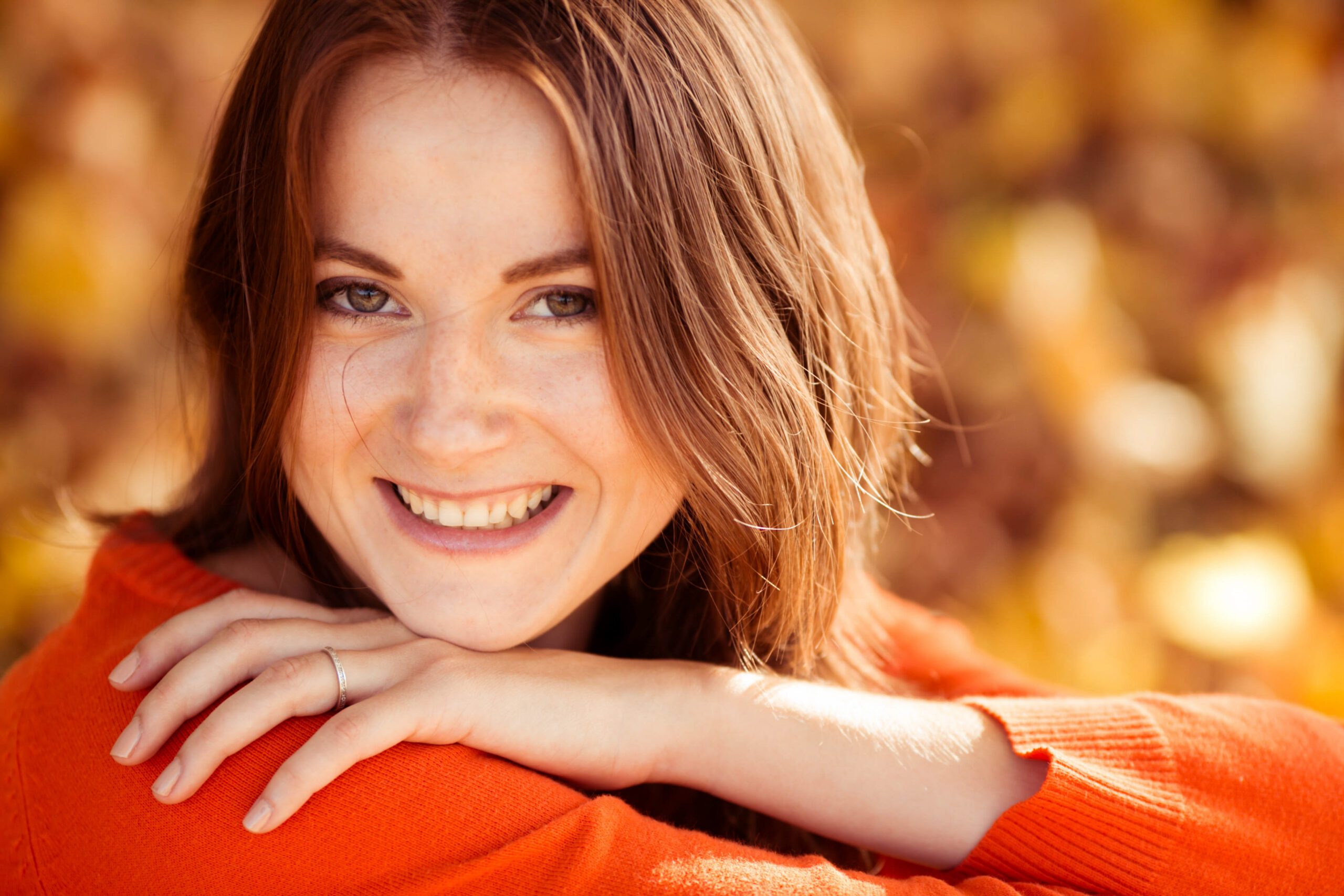 young woman portrait in autumn color